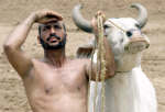 A farmer looks up at the sky. Photo: Reuters/Dipak Kumar